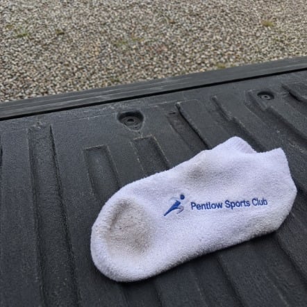 Branded fuzzy socks with logo