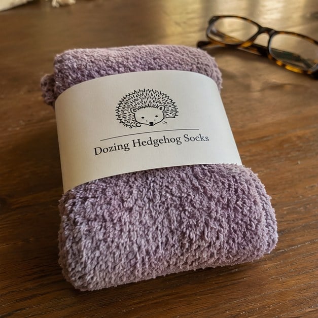 Fuzzy socks with logo — customer photo